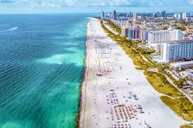 Aerial view of Miami Beach coastline representing residential Manual J HVAC load calculation services in South Florida